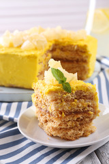 Tasty lemon dessert on wooden table