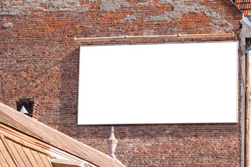 blank billboard on a brick building