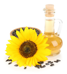 Sunflower with seeds and oil isolated on white