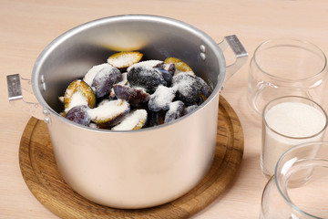 Cooking delicious drain jam in kitchen