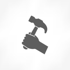 hammer in hand icon
