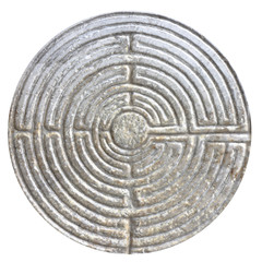 Labyrinth carved on the facade of a Romanesque church - obrazy, fototapety, plakaty