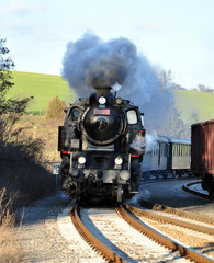 Fototapeta na wymiar Detailed view of an old steam locomotive