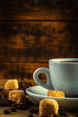 Coffee espresso with cane sugar and coffee beans.