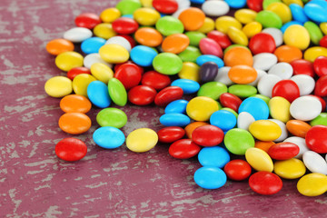 Fototapeta na wymiar Colorful candies on bright background