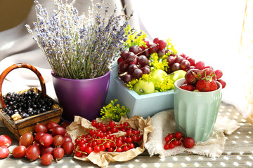 Still life with berries and flowers