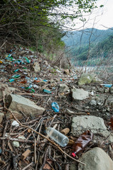 Environmental problems and nature pollution by pile of rubbish