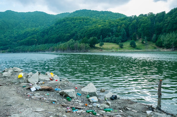 Environmental problems and nature pollution by pile of rubbish