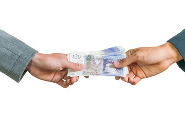 Businessmen exchanging british money pounds sterling