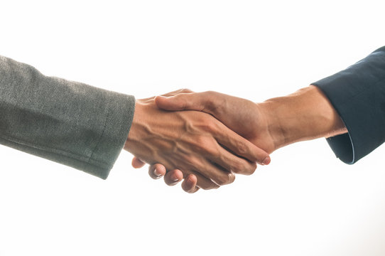 Businessmen handshake isolated on white