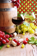 Wine with grapes on table on brown background