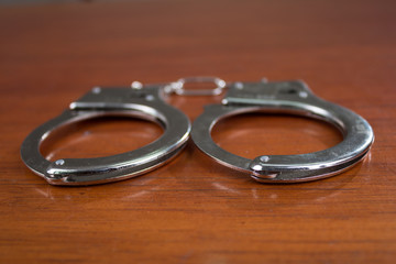 Closeup shot of metallic handcuffs