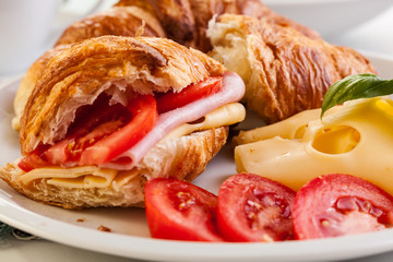 Breakfast witch croissant, cheese and hot coffee