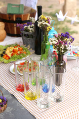 Buffet table with dishware waiting for guests