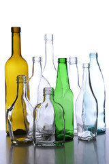 Empty glass bottles isolated on white