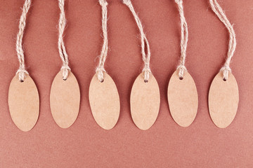 Brown tags on colorful background