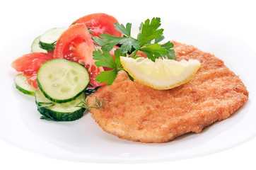 Chicken schnitzel with vegetables and herb