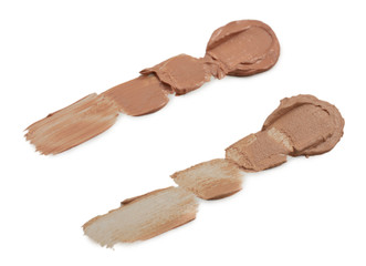 Different liquid foundation isolated on white