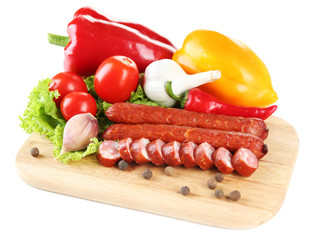 Smoked thin sausages and vegetables