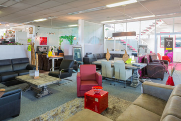 Furniture showroom with tables and chairs