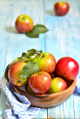 Apple in a wooden bowl.