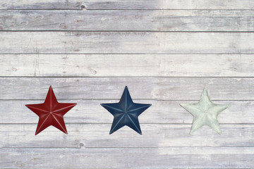 Fototapeta na wymiar Red white and blue stars on wood floor