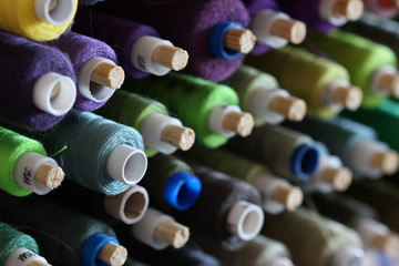 A big amount of spools with colorful threads