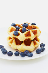 Waffle with berry on white c