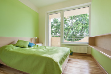 Green bedroom in apartment