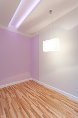 Empty room with illuminated ceiling