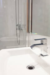 Close-up of sink in luxurious bathroom