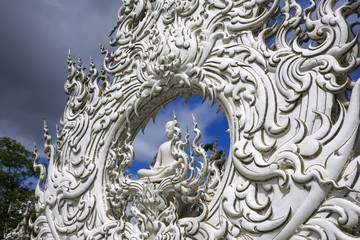 Wat Rong Khun, Architectural Details. Sitting Buddha.