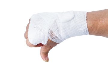 Thumb down showing by hand with white bandages isolated