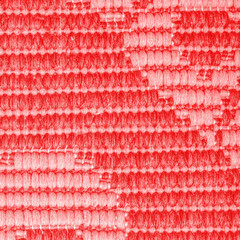 fragment of red textile texture closeup