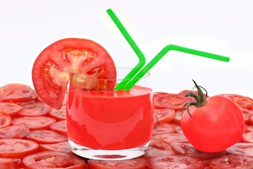 Tomato Juice in glass, tomato and tomato slice