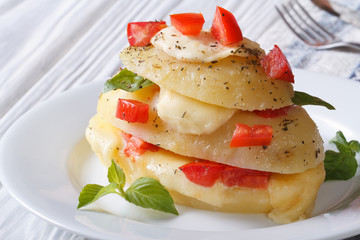 Boiled new potatoes with mozzarella, tomato and basil