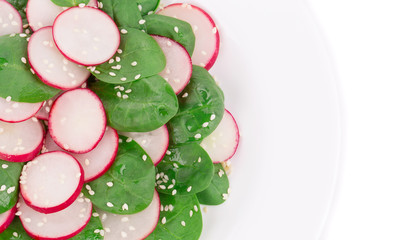 Radish salad with spinach.
