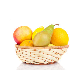 Wicker basket with fruits.
