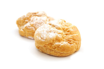 baked  bread with icing on white background