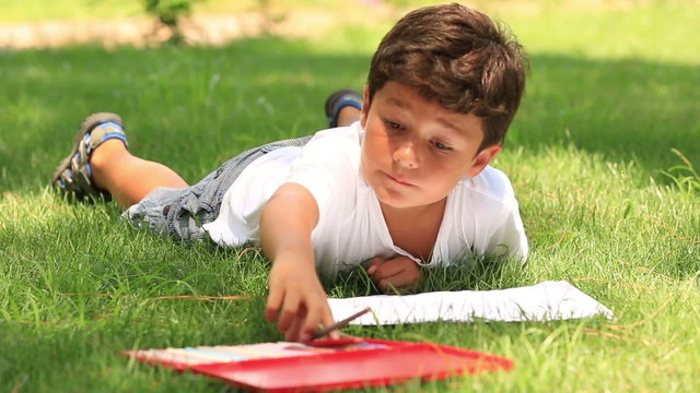 Child painting in the park