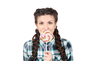 Girl with braids and lollipop.