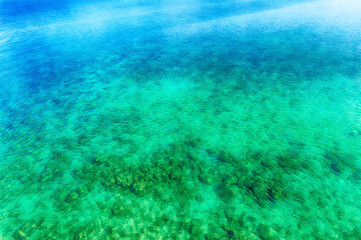 Fototapeta na wymiar Emerald green ocean in Okinawa