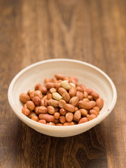 rustic raw uncooked peanuts