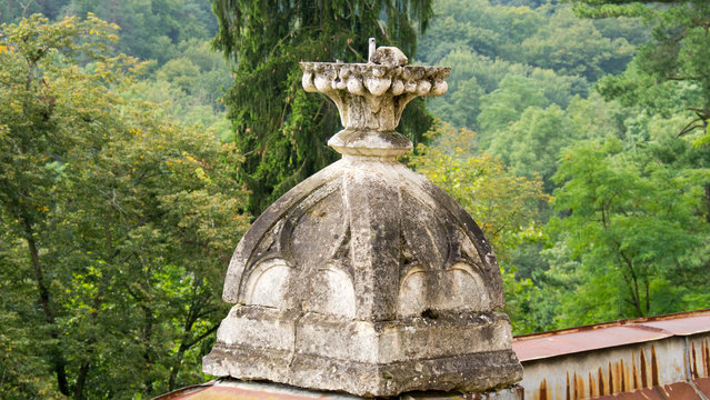 A carved stone top of the castle greenhouse