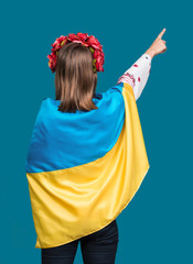 Portrait of attractive young  girl in national dress with  Ukrai