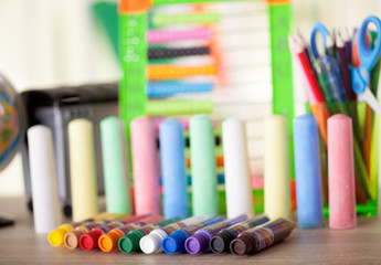 Full background of a colorful assortment of school supplies
