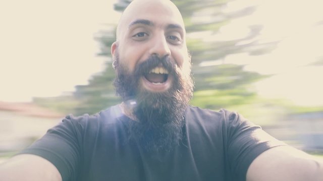 bearded man having fun playing aroung