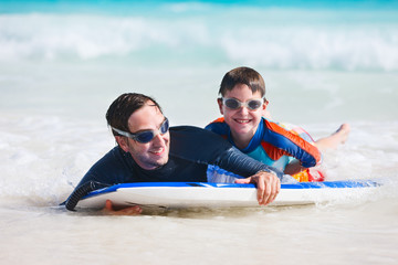 Father and son surfing