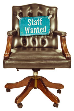 Retro office chair with staff wanted sign isolated on white