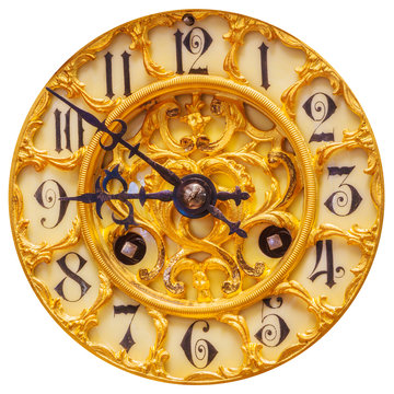 Rich decorated golden clock face isolated on white